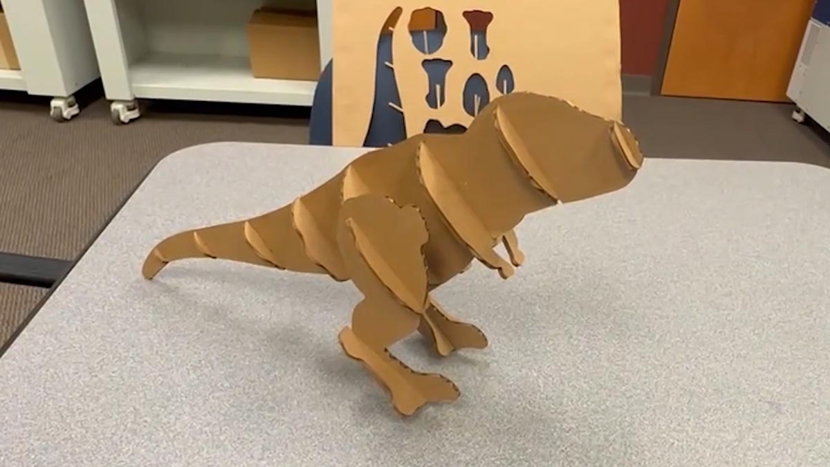 the finished product is a completed dinosaur assembly