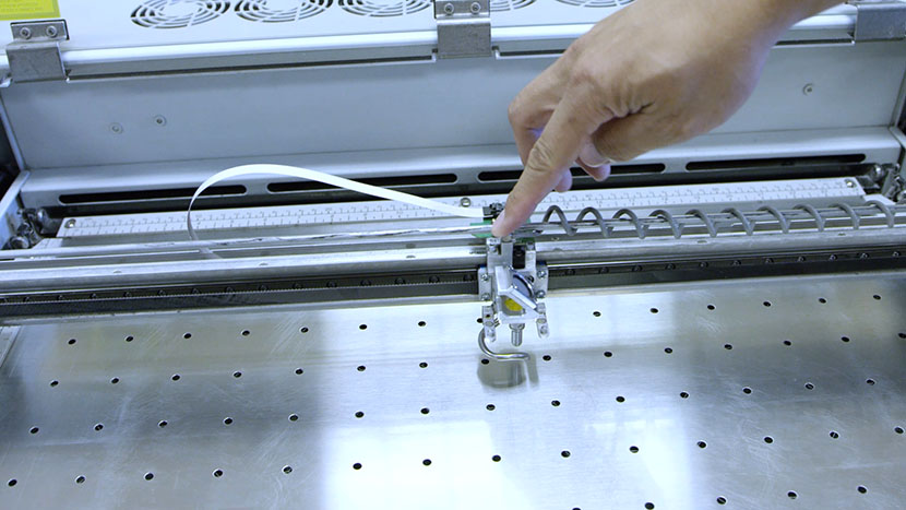 Pushing the lens assembly along the X-Axis.