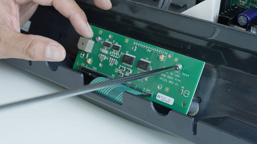 Inserting the four PCB screws